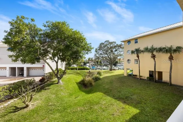 a view of a house with a big yard