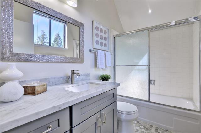 4 Farm Road Los Altos, CA 94024 - Photo 15 of 25 a bathroom with a granite countertop sink toilet and shower