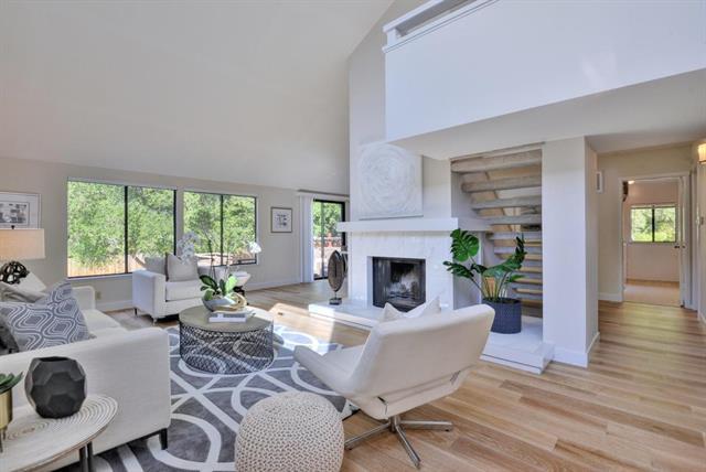 4 Farm Road Los Altos, CA 94024 - Photo 2 of 25 a living room with fireplace furniture and a large window