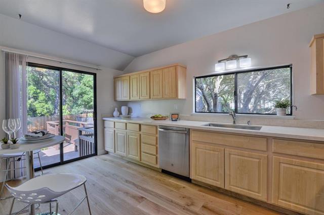 4 Farm Road Los Altos, CA 94024 - Photo 5 of 25 a kitchen with sink cabinets and wooden floor