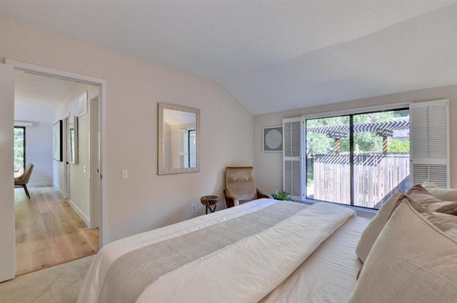 4 Farm Road Los Altos, CA 94024 - Photo 8 of 25 a bedroom with a large bed and a large window