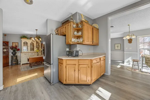a bathroom with a sink a mirror and a shower