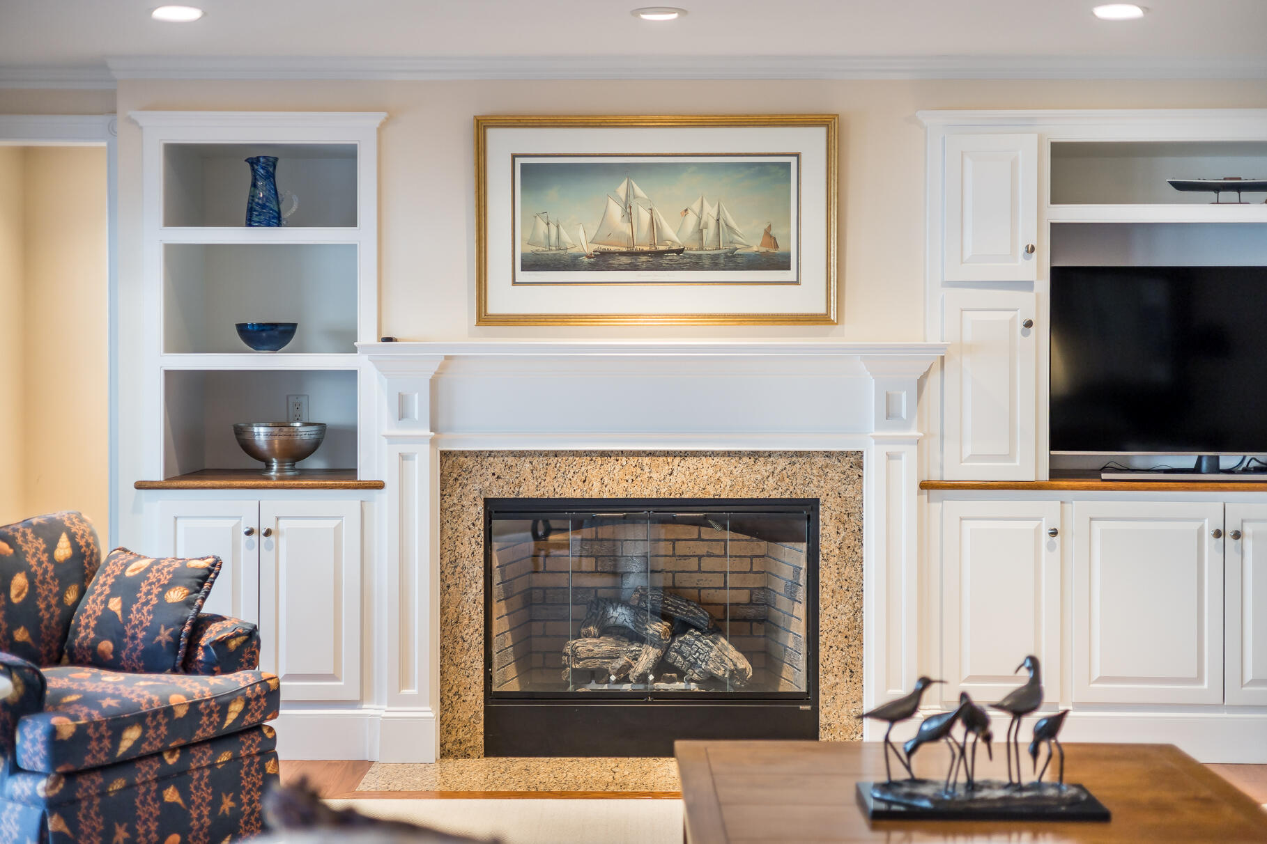 10 Brian Way Harwich, MA 02645 - Photo 19 of 75 a living room with furniture a flat screen tv and a fireplace