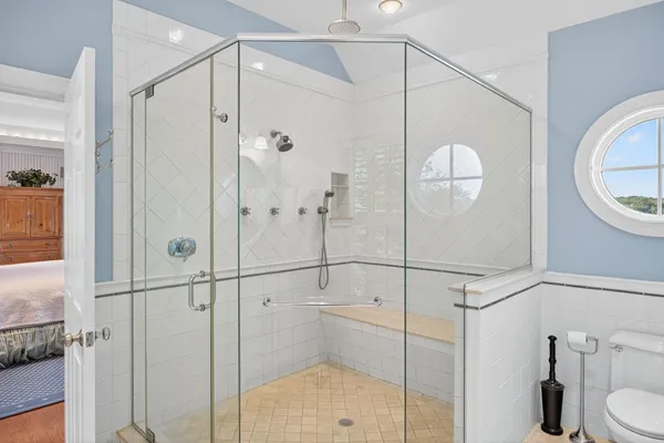 a bathroom with a sink double vanity and a mirror