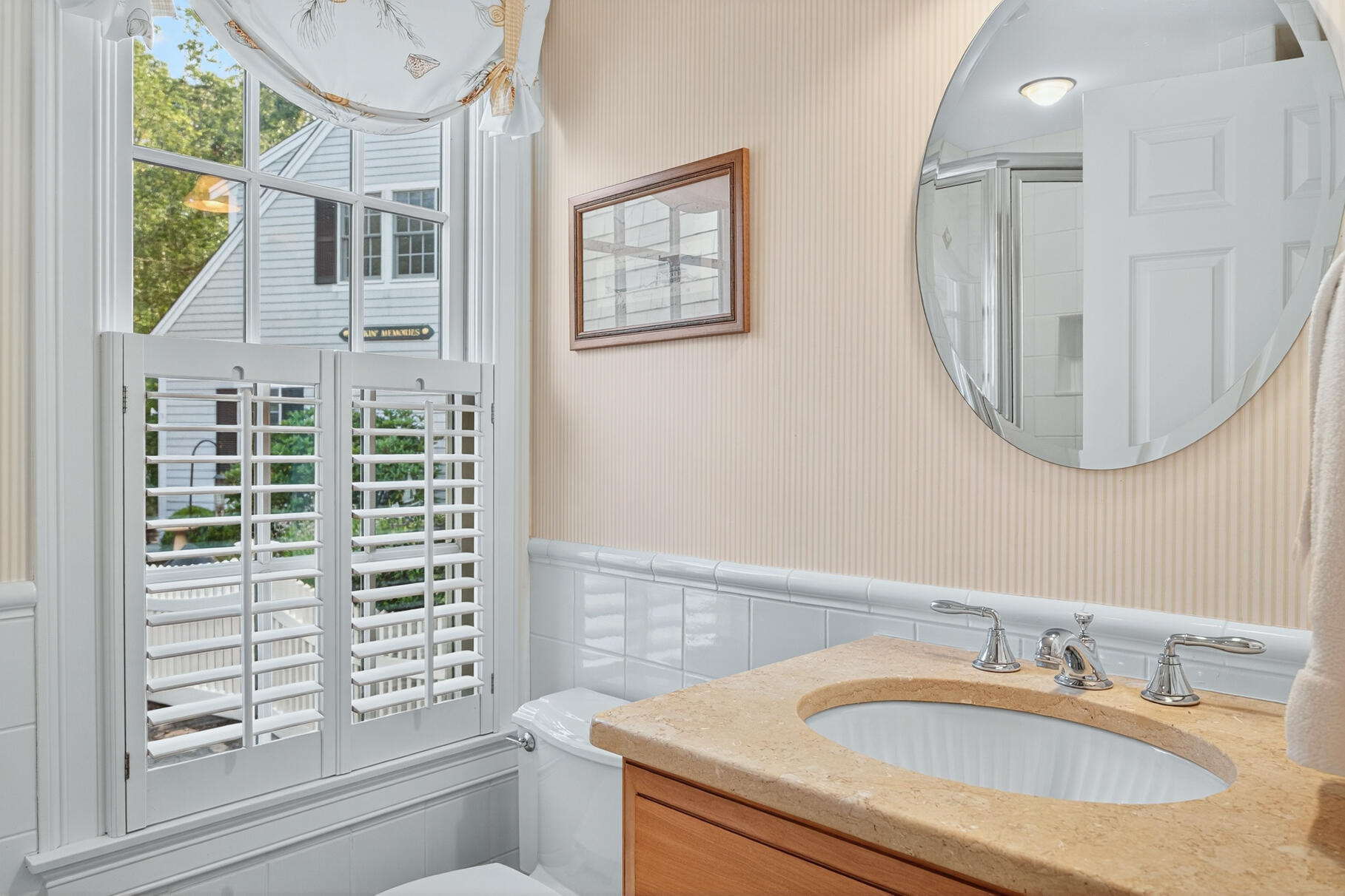 10 Brian Way Harwich, MA 02645 - Photo 29 of 75 a bathroom with a granite countertop sink and a mirror