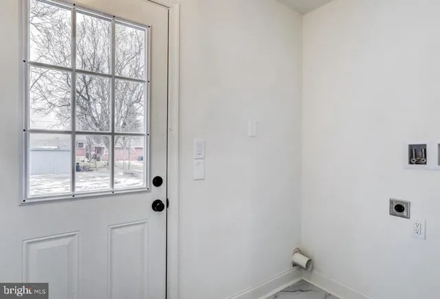 a view of a window in an empty room