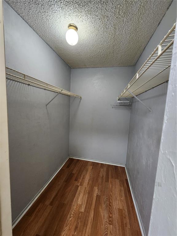 719 Southwest 75th Street, Unit 103 Gainesville, FL 32607 - Photo 7 of 28 a view of a room with wooden floor