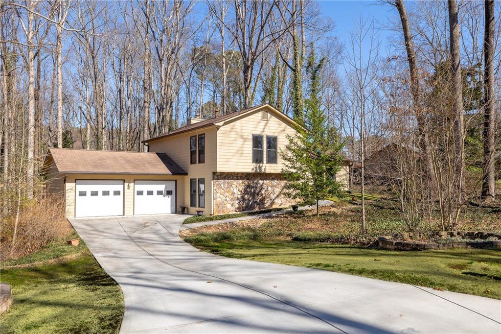 175 Andover Alpharetta, GA 30004 - Photo 1 of 1 front view of a house with a yard