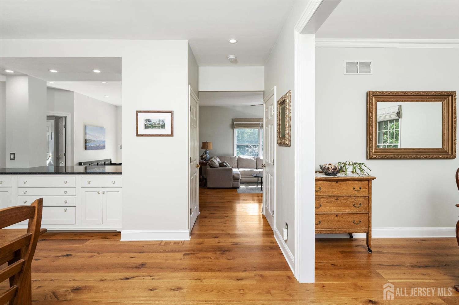63 Iron Bridge Road Hamilton, NJ 08620 - Photo 2 of 48 a view of a living room kitchen and a wooden floor