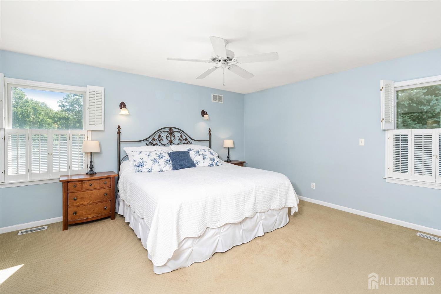 63 Iron Bridge Road Hamilton, NJ 08620 - Photo 22 of 48 a bedroom with a bed and a window