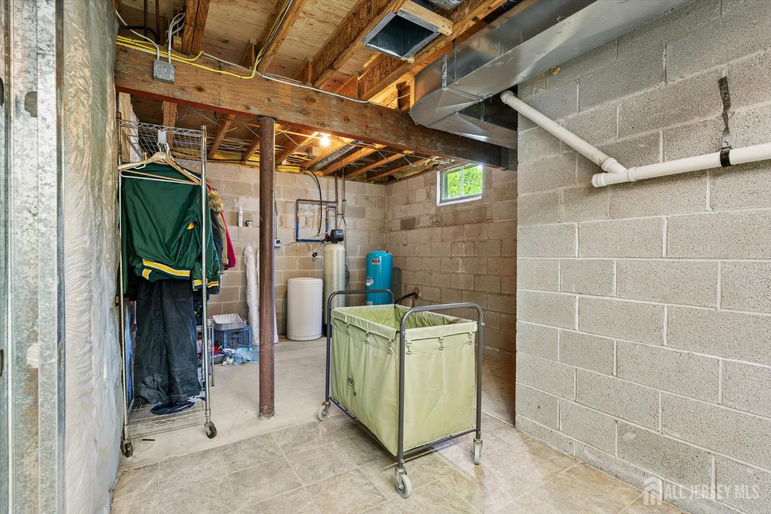 63 Iron Bridge Road Hamilton, NJ 08620 - Photo 28 of 48 a utility room with dryer and washer