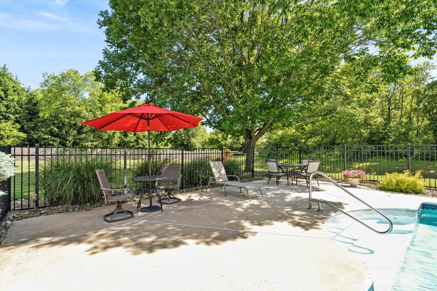 63 Iron Bridge Road Hamilton, NJ 08620 - Photo 35 of 48 a view of a lake with a patio