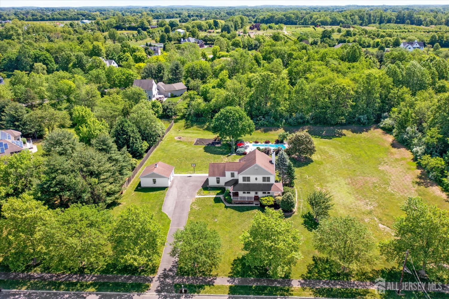 63 Iron Bridge Road Hamilton, NJ 08620 - Photo 45 of 48 an aerial view of residential house with outdoor space and swimming pool