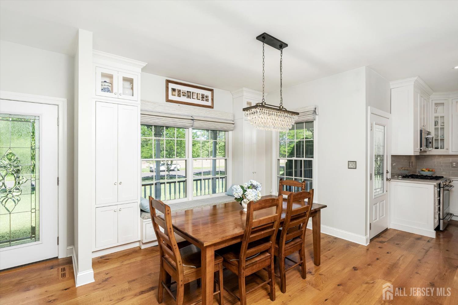 63 Iron Bridge Road Hamilton, NJ 08620 - Photo 5 of 48 a dining room with furniture window wooden floor
