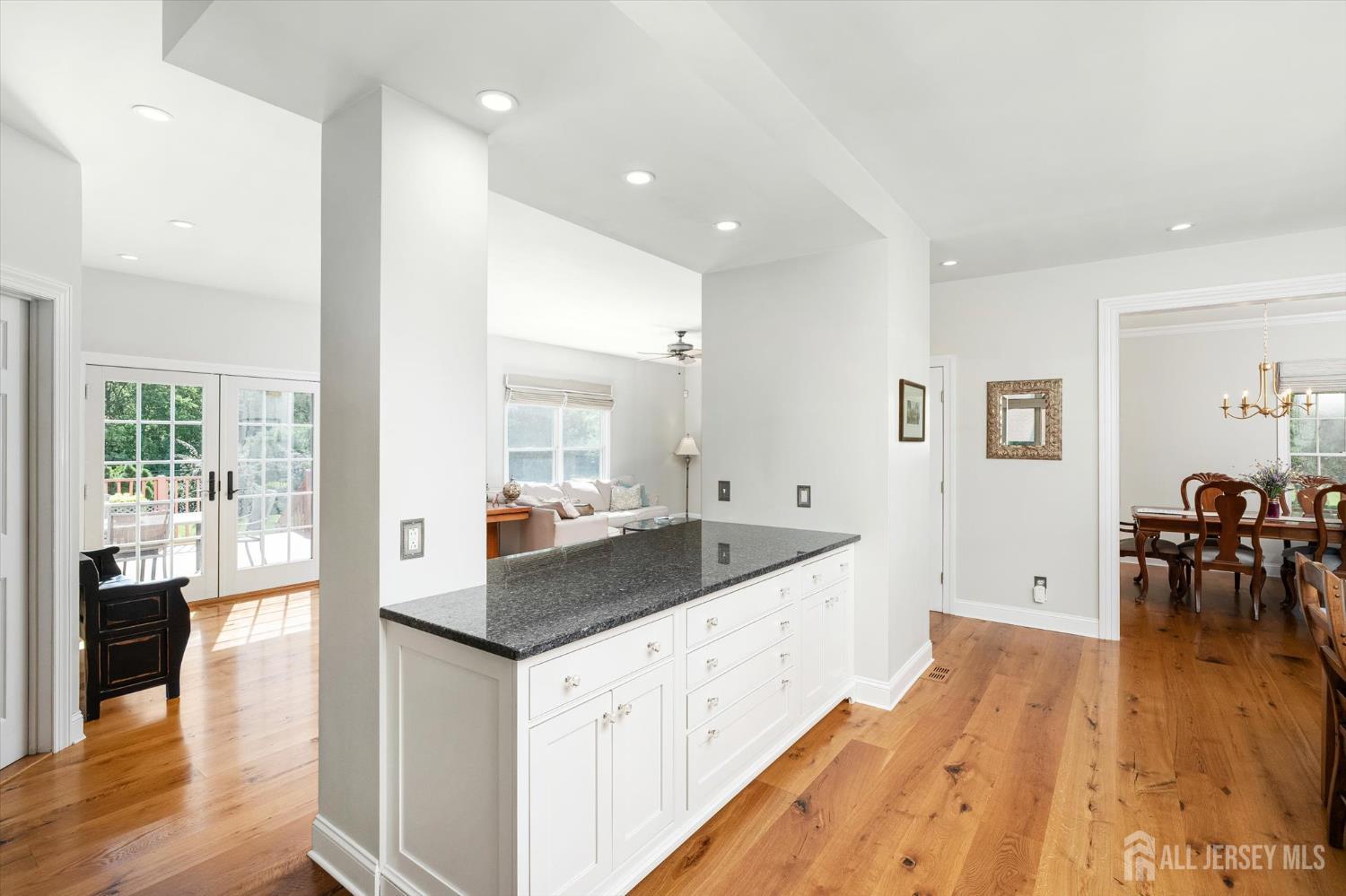 63 Iron Bridge Road Hamilton, NJ 08620 - Photo 8 of 48 a kitchen with counter top space and wooden floor