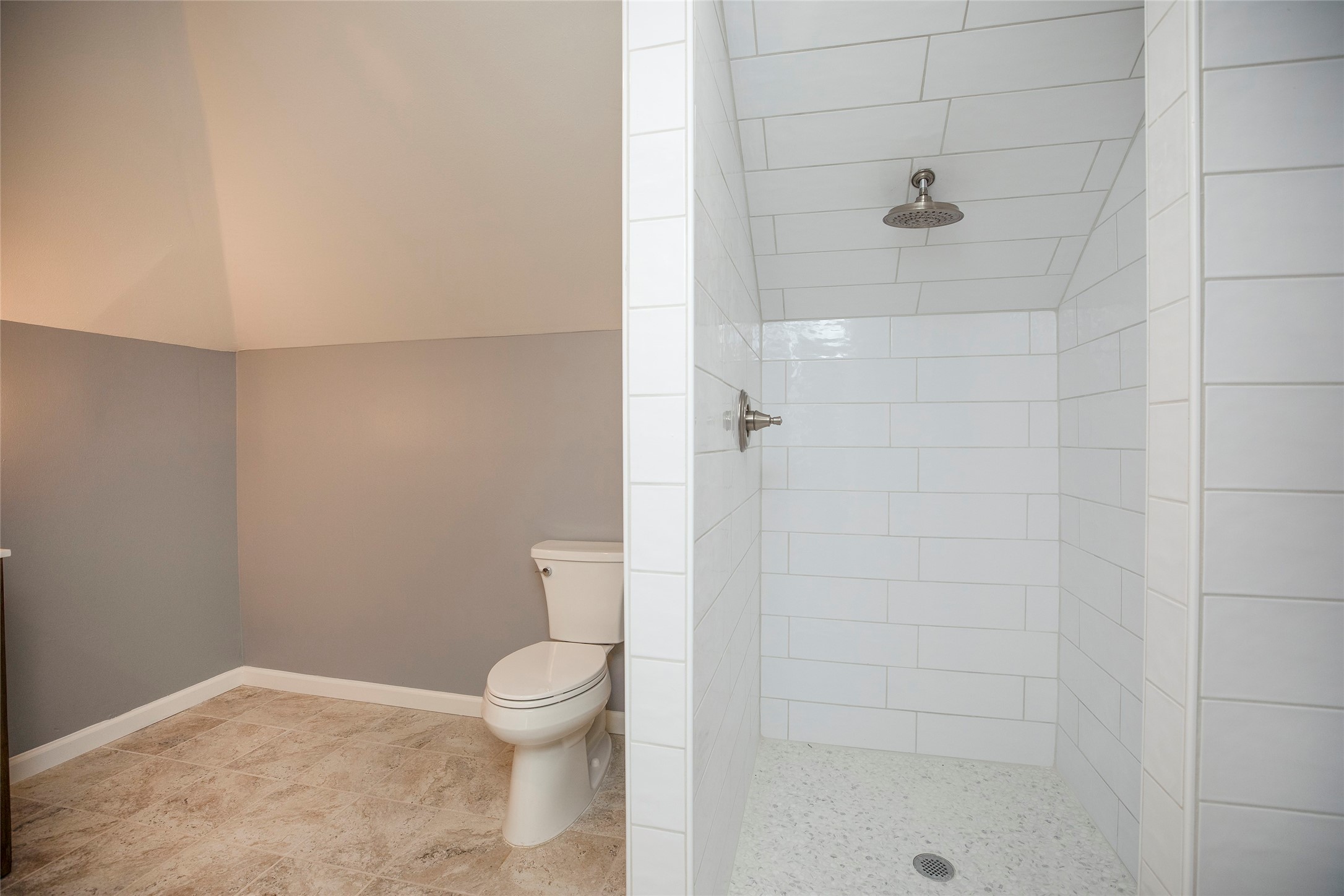 1202 Birdsall Street Houston, TX 77007 - Photo 27 of 30 a bathroom with a toilet and a shower