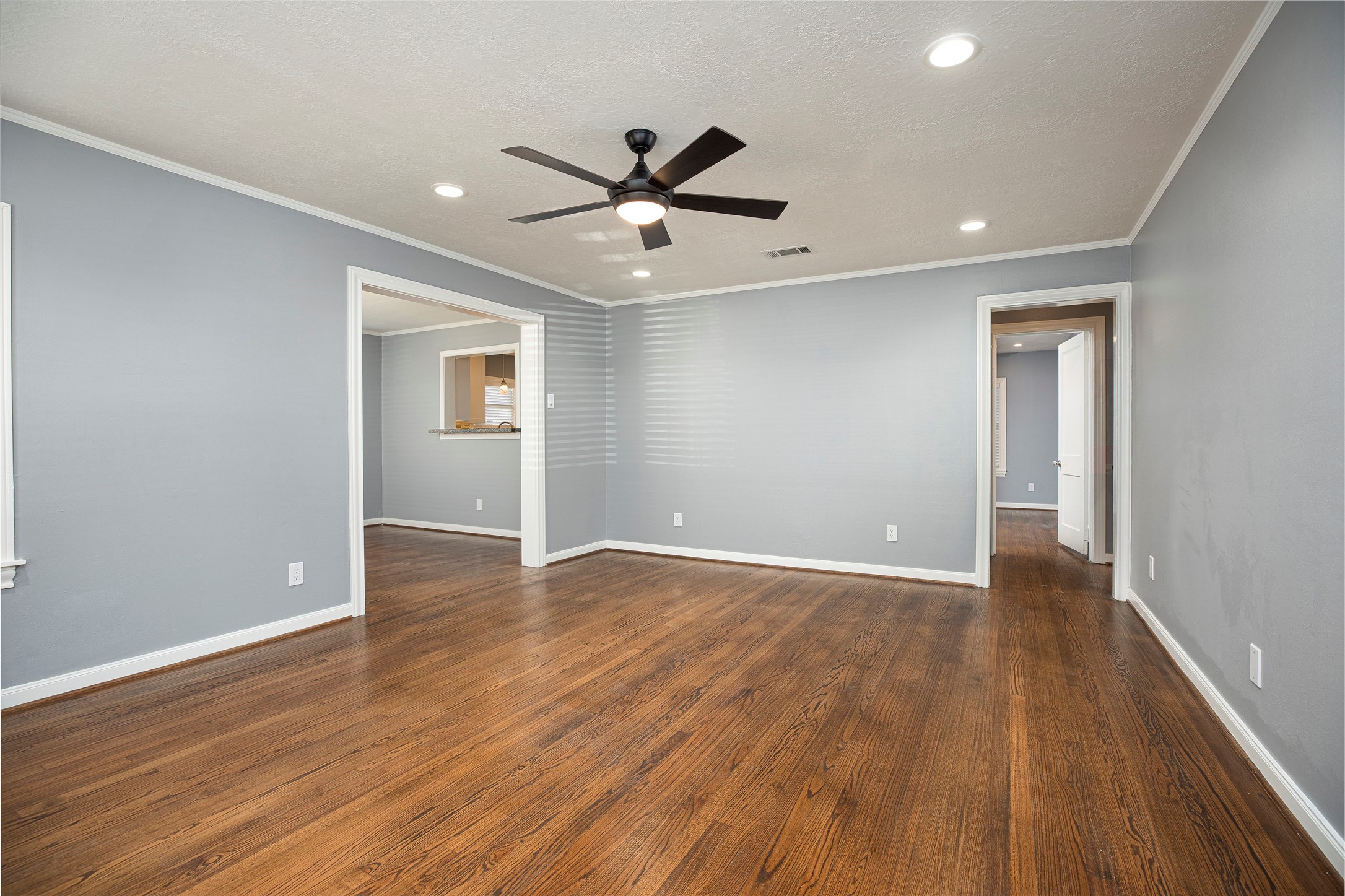 1202 Birdsall Street Houston, TX 77007 - Photo 4 of 30 a view of an empty room with wooden floor