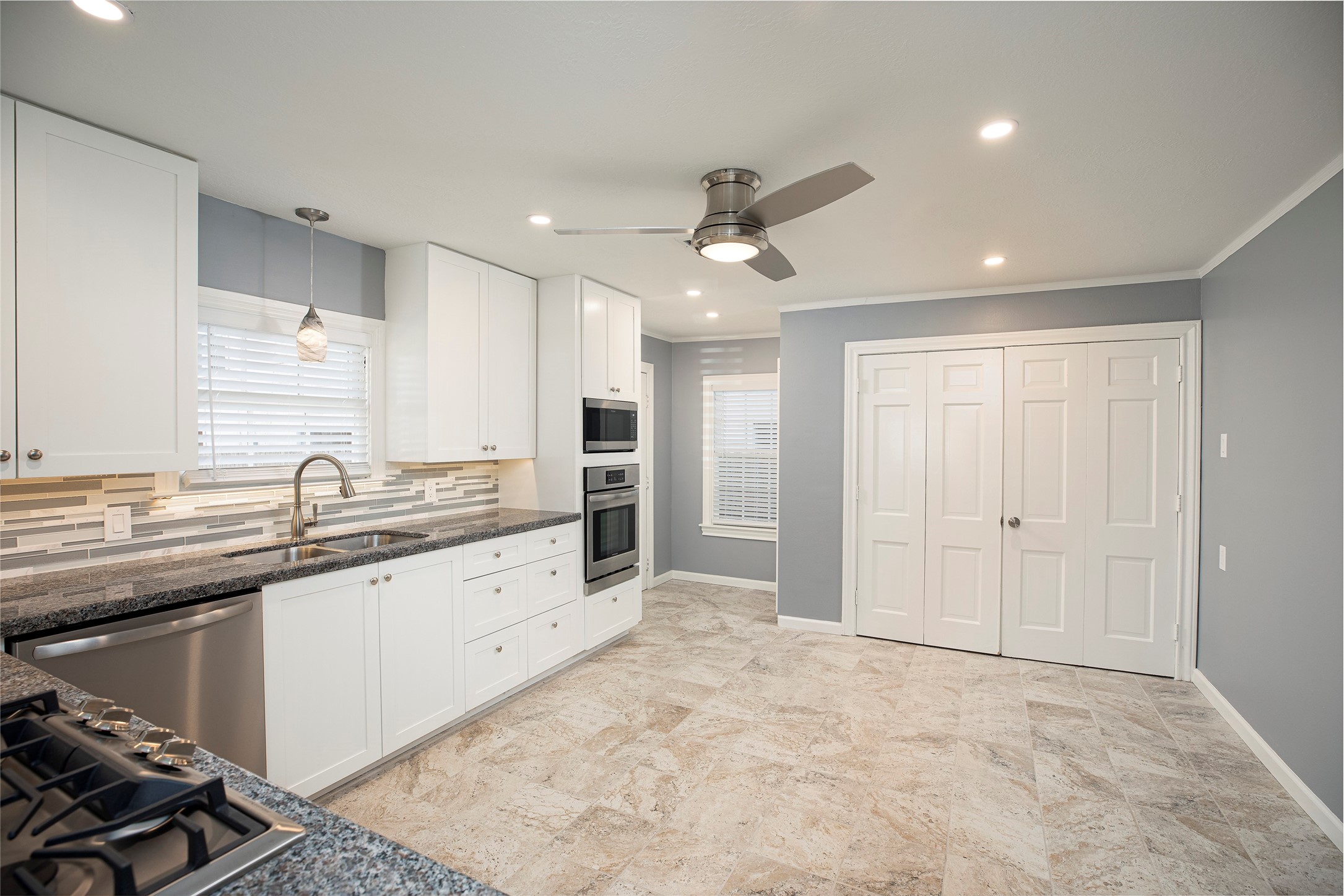 1202 Birdsall Street Houston, TX 77007 - Photo 8 of 30 a large kitchen with kitchen island a sink stainless steel appliances and cabinets
