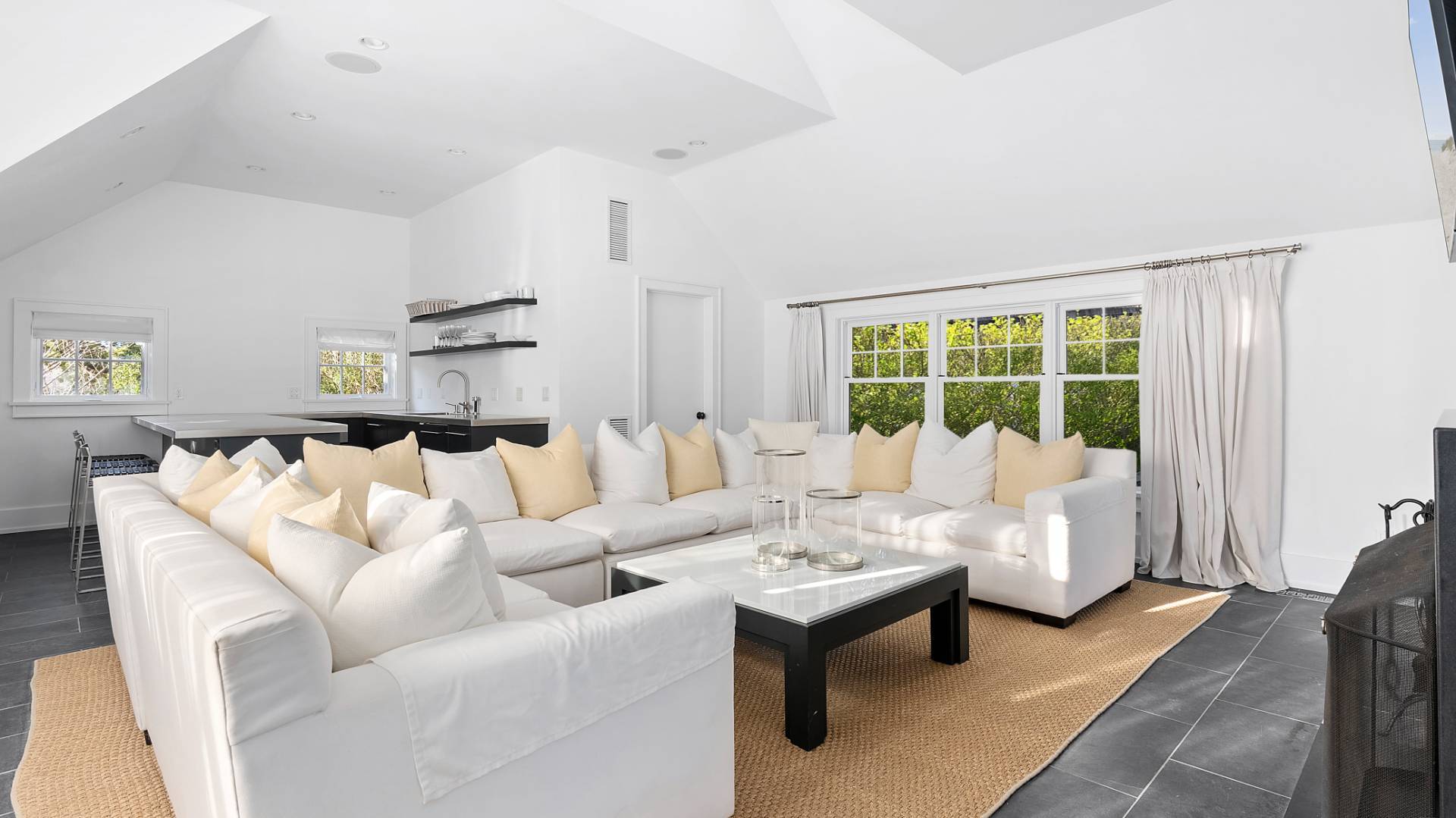 21 Surfside Drive Bridgehampton, NY 11932 - Photo 23 of 25 a living room with furniture and a large window