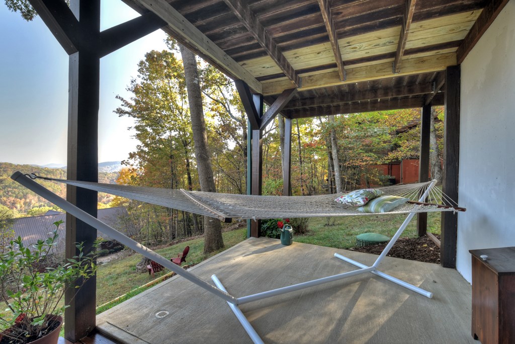 392 Eagles Nest Mountain Road Blue Ridge, GA 30513 - Photo 38 of 51 a view of porch with green trees