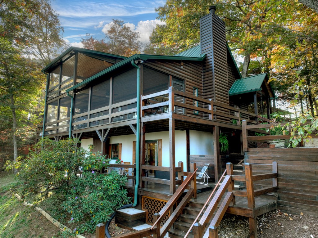 392 Eagles Nest Mountain Road Blue Ridge, GA 30513 - Photo 44 of 51 a front view of a house with balcony