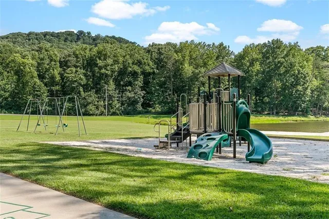 a view of a park with a slide