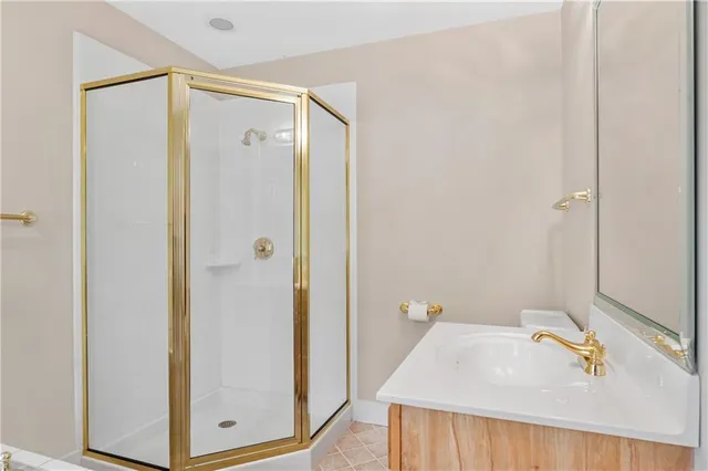 a bathroom with a tub and shower