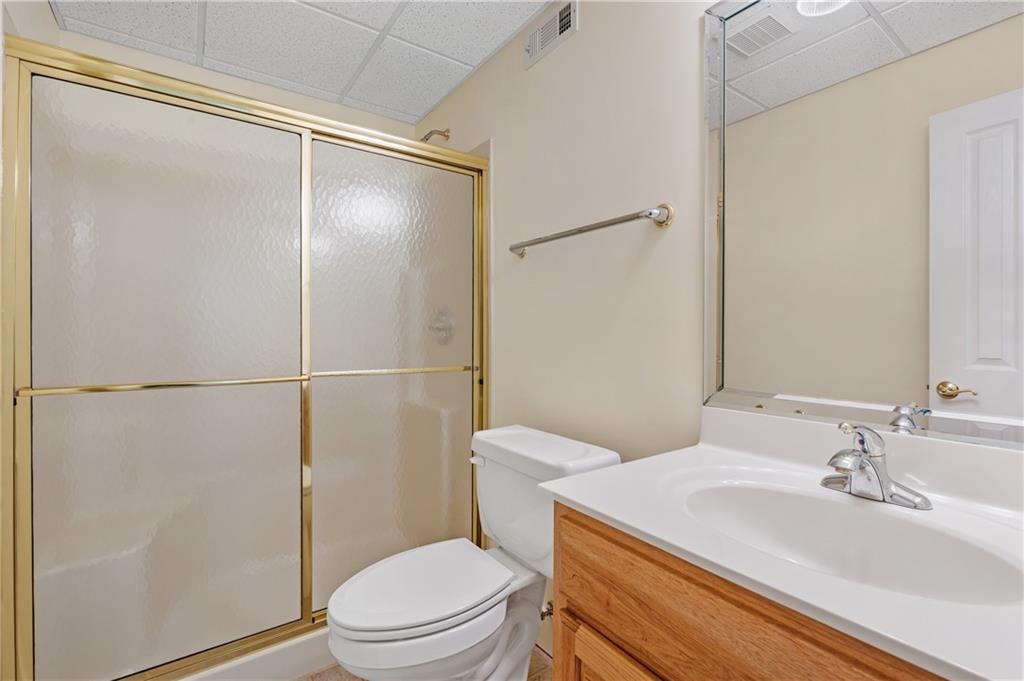 267 Starcross Lane Jasper, GA 30143 - Photo 39 of 46 a bathroom with a sink toilet and shower