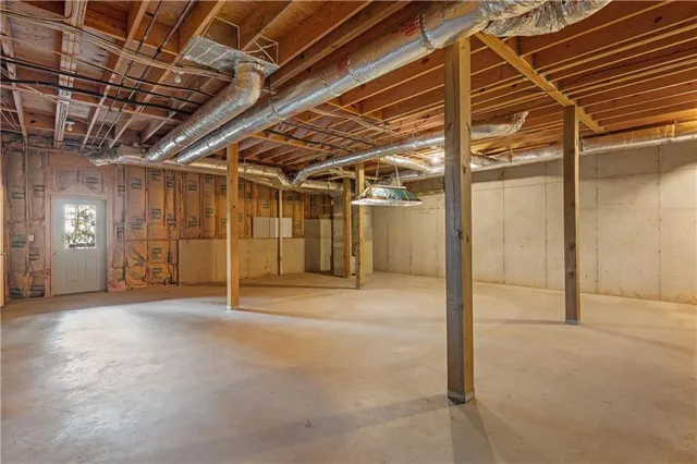 a view of a room with wooden walls