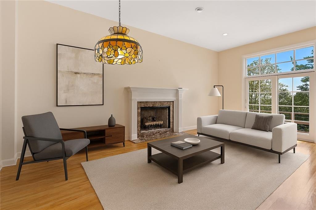 267 Starcross Lane Jasper, GA 30143 - Photo 5 of 46 a living room with furniture and a fireplace