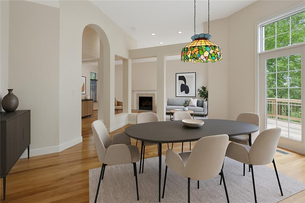 267 Starcross Lane Jasper, GA 30143 - Photo 7 of 46 a view of a dining room with furniture window and wooden floor