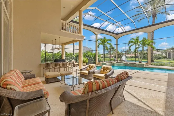 a house with swimming pool in front of it