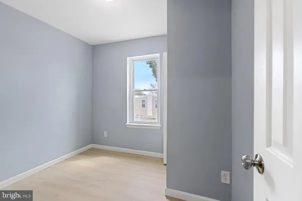a view of empty room with windows