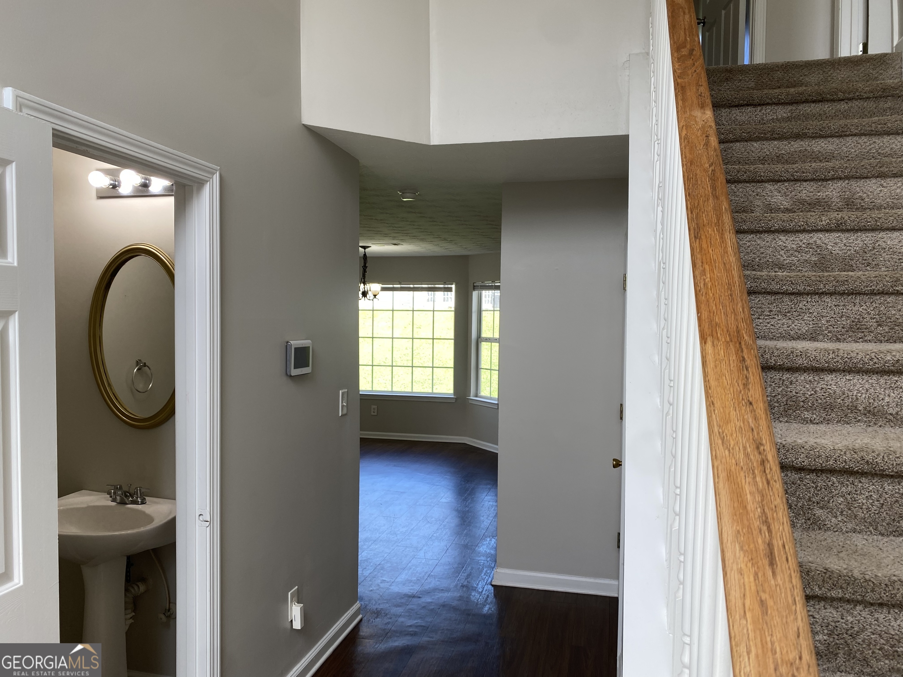 456 Parkside Way McDonough, GA 30253 - Photo 4 of 14 a view of a livingroom with furniture and a window