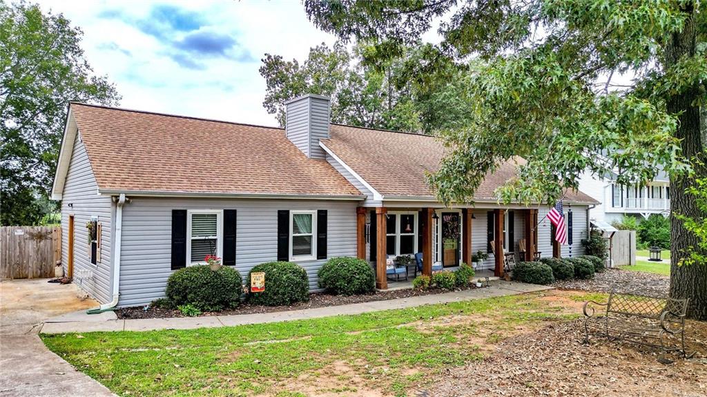 25 Magnolia Court Rydal, GA 30171 - Photo 1 of 1 a view of a house with backyard and garden