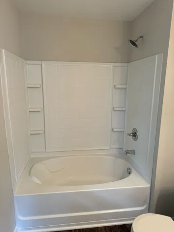a bathroom with a bathtub