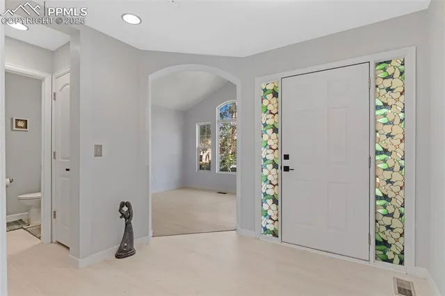 wooden floor and window in a room