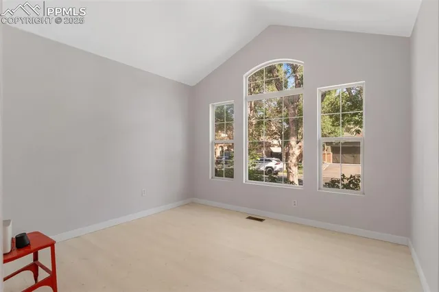 an empty room with windows