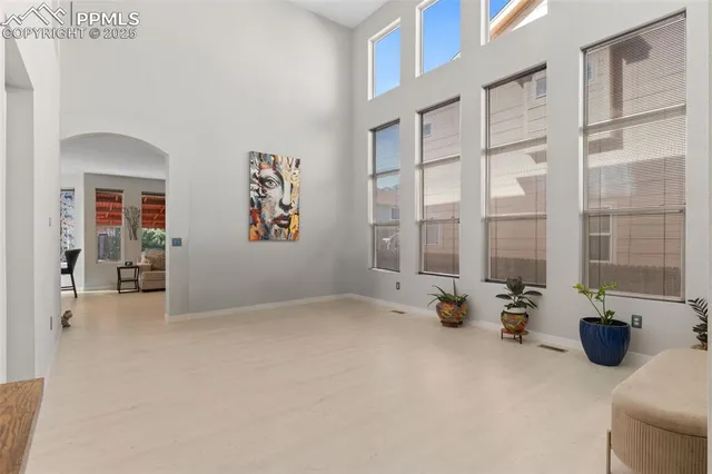 a view of livingroom with furniture and windows