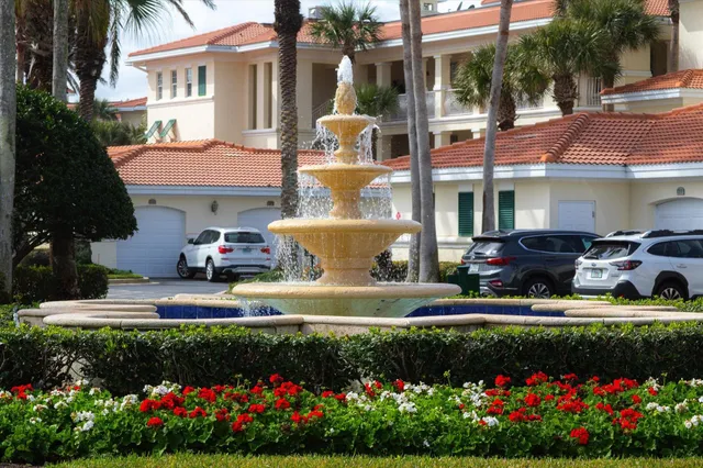 a kitchen with a dining table and chairs