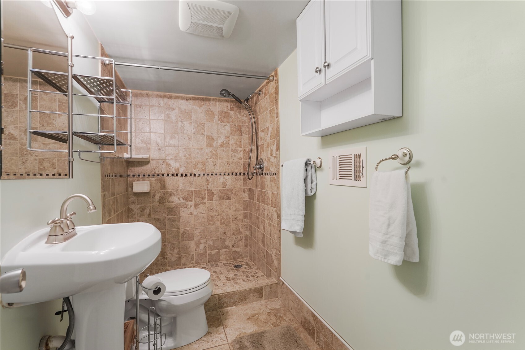 2120 Seaview Street West University Place, WA 98466 - Photo 23 of 33 a bathroom with a sink toilet and shower