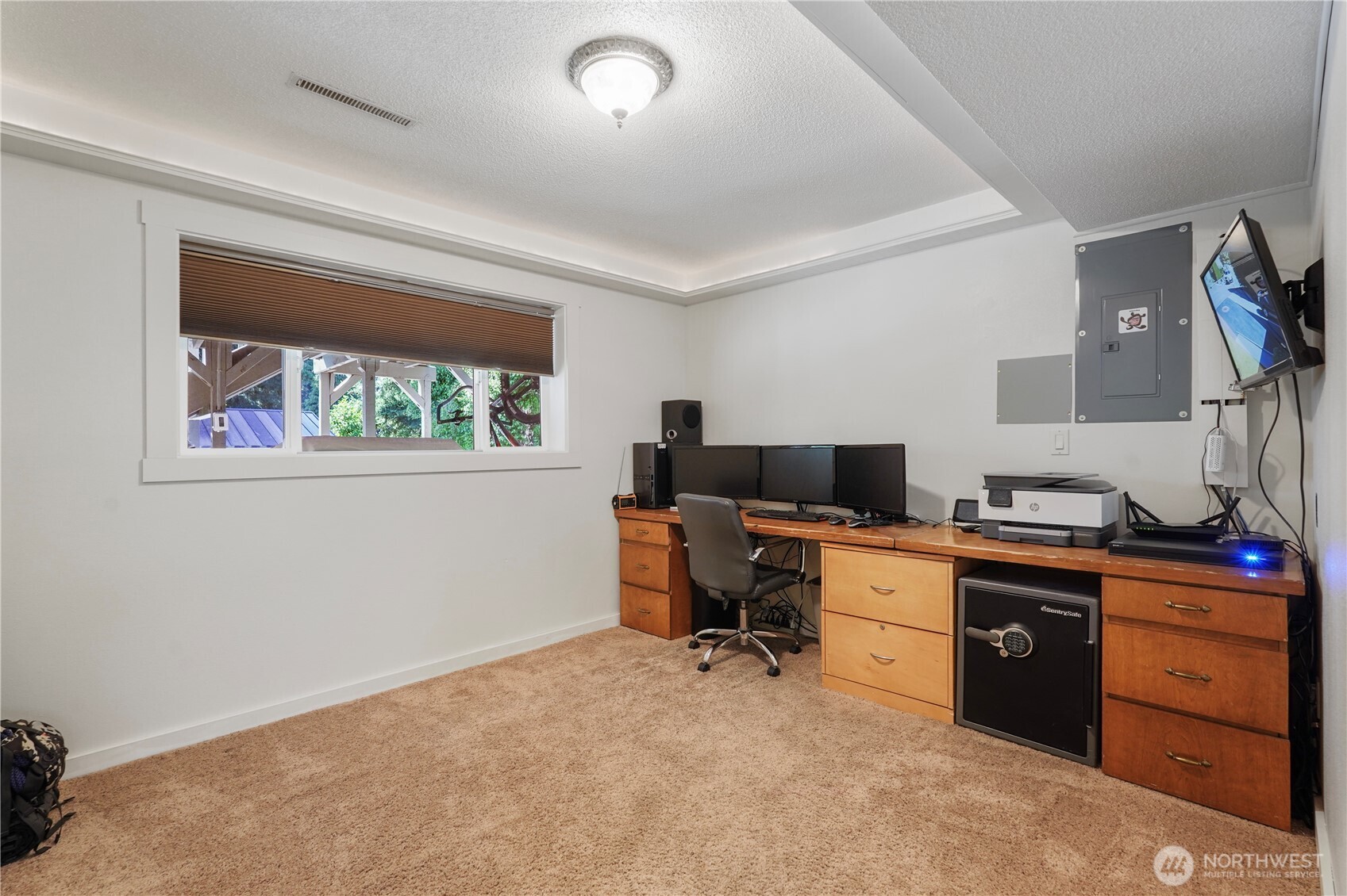2120 Seaview Street West University Place, WA 98466 - Photo 26 of 33 a view of a workspace with furniture and a window