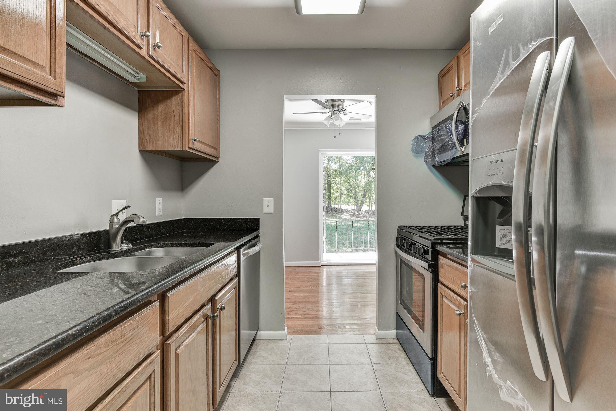 3368 Hewitt Avenue, Unit 202 Silver Spring, MD 20906 - Photo 3 of 25 All Stainless Appliances with Granite Countertops