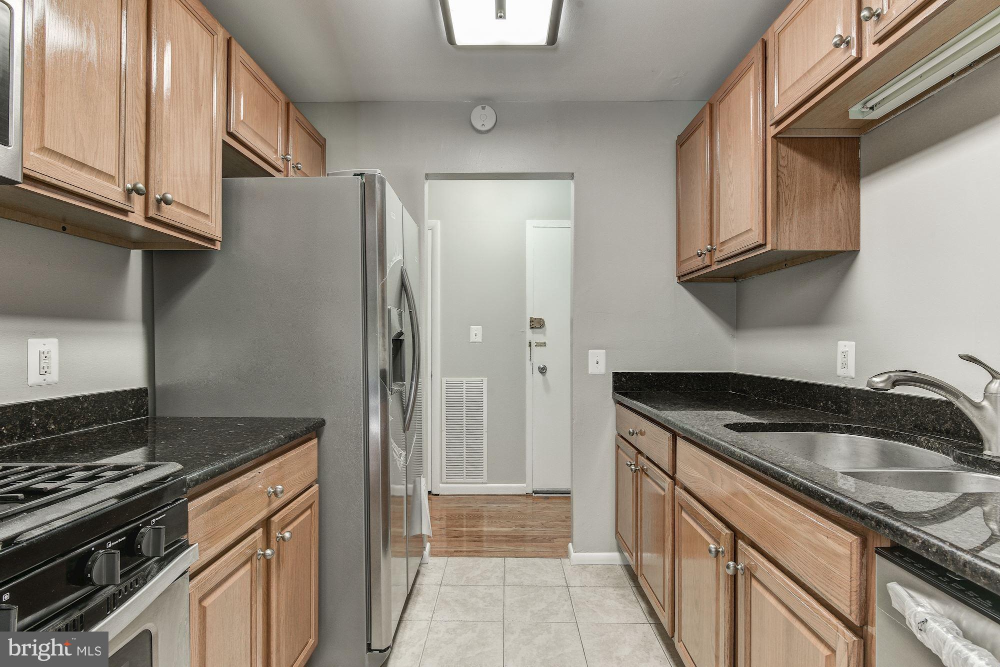 3368 Hewitt Avenue, Unit 202 Silver Spring, MD 20906 - Photo 4 of 25 All Stainless Appliances with Granite Countertops