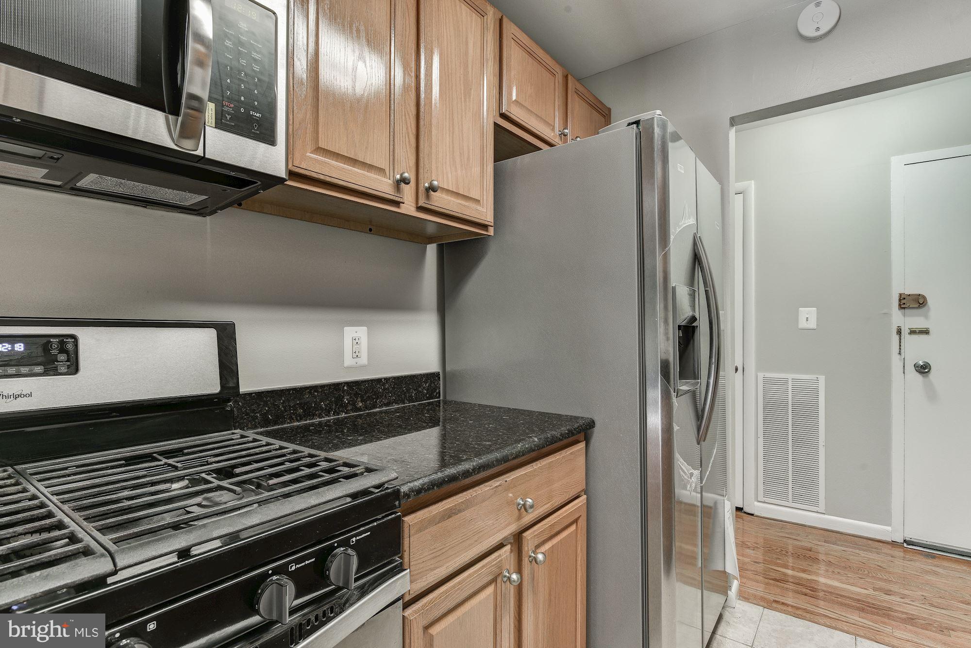 3368 Hewitt Avenue, Unit 202 Silver Spring, MD 20906 - Photo 5 of 25 All Stainless Appliances with Granite Countertops