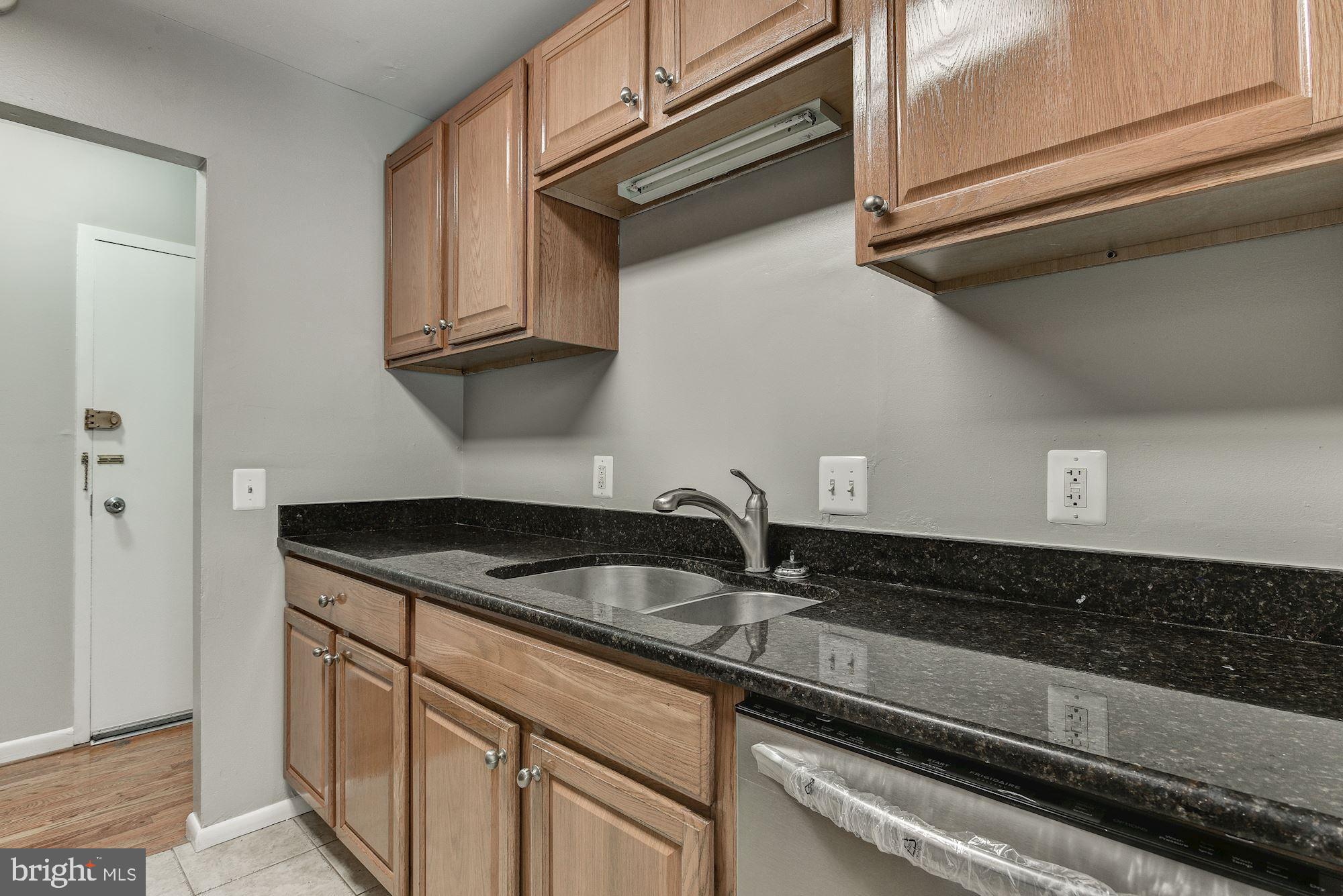 3368 Hewitt Avenue, Unit 202 Silver Spring, MD 20906 - Photo 7 of 25 All Stainless Appliances with Granite Countertops
