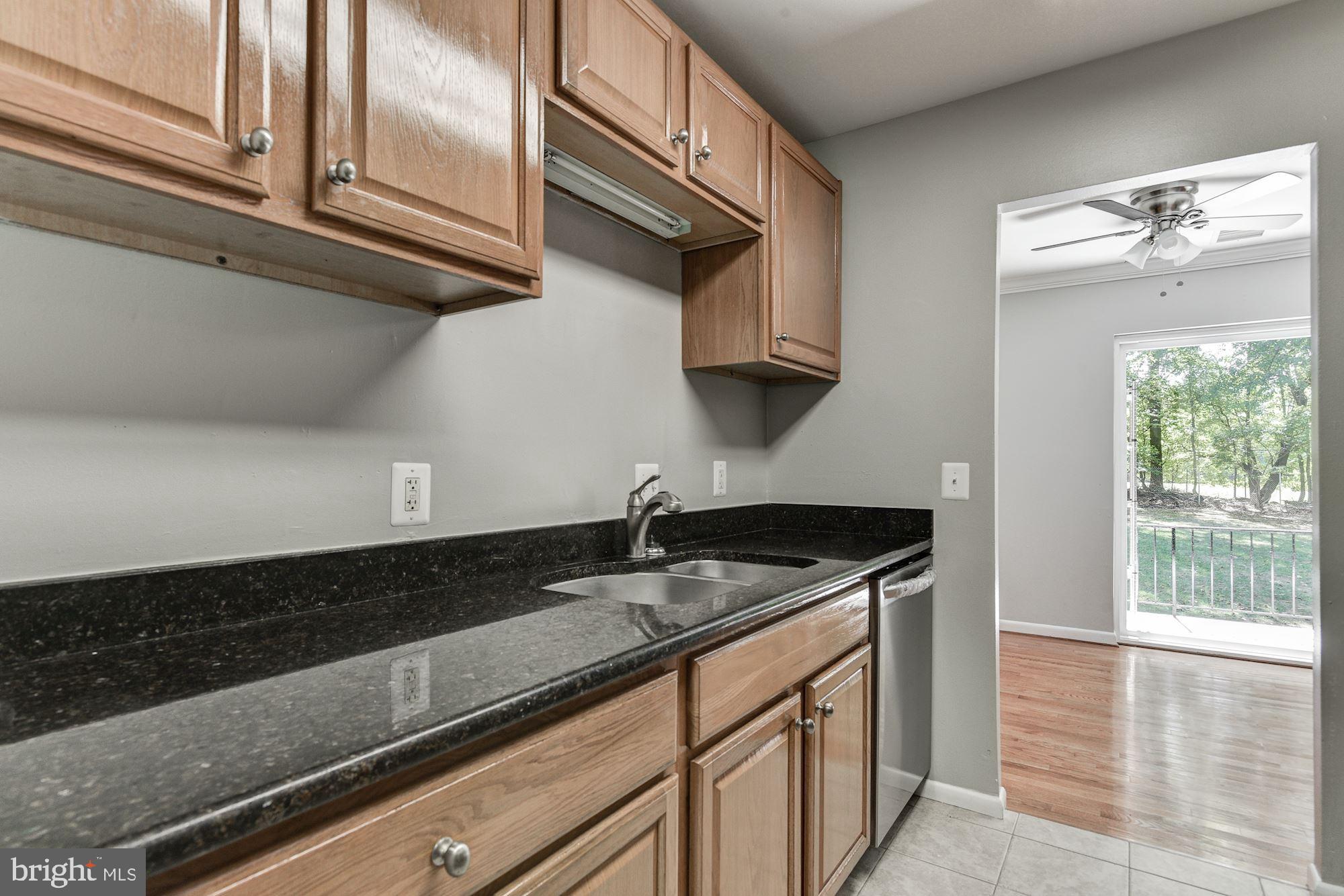 3368 Hewitt Avenue, Unit 202 Silver Spring, MD 20906 - Photo 8 of 25 All Stainless Appliances with Granite Countertops