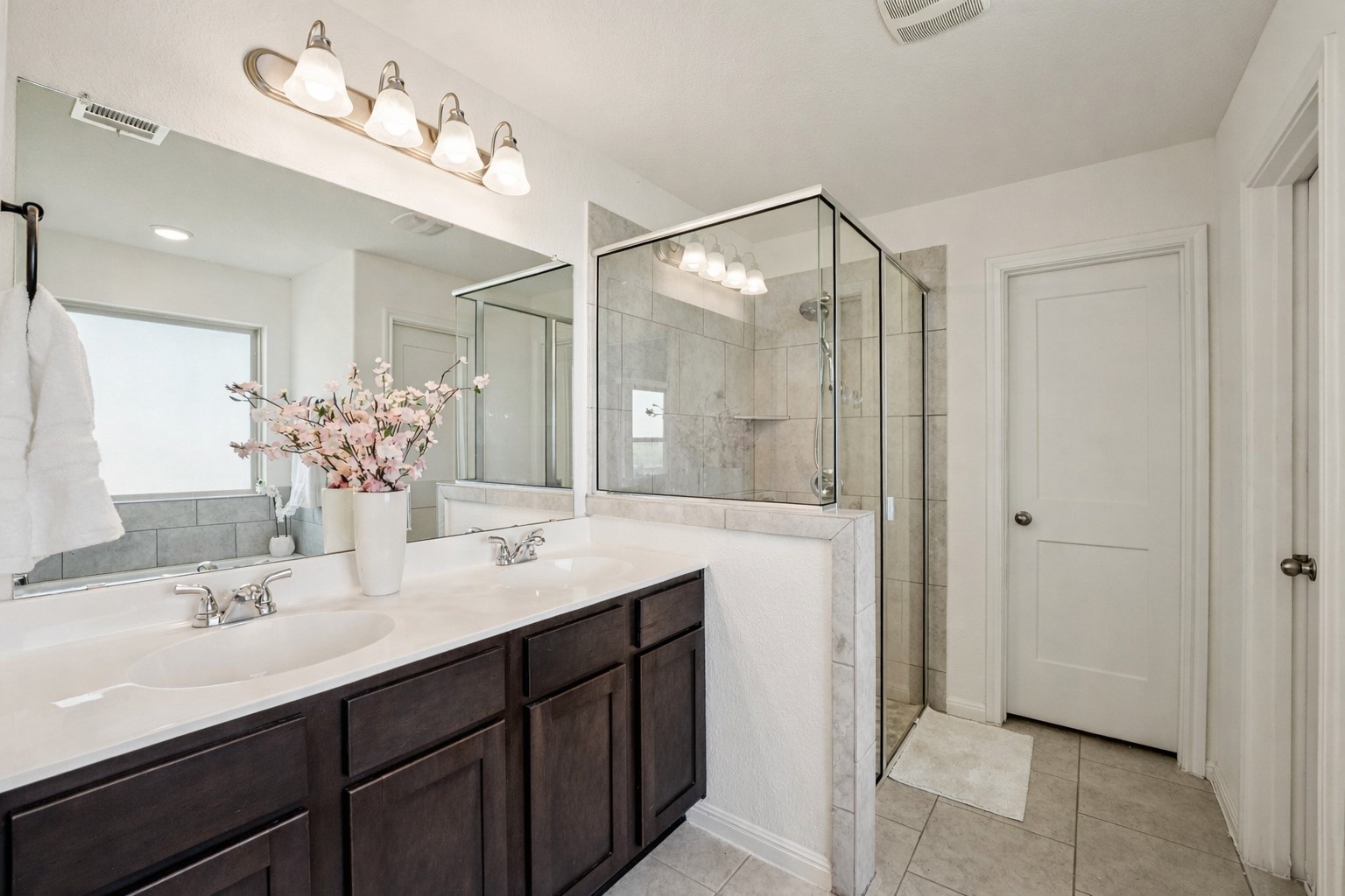 210 Helen Road Hutto, TX 78634 - Photo 8 of 20 a bathroom with a double vanity sink mirror and double