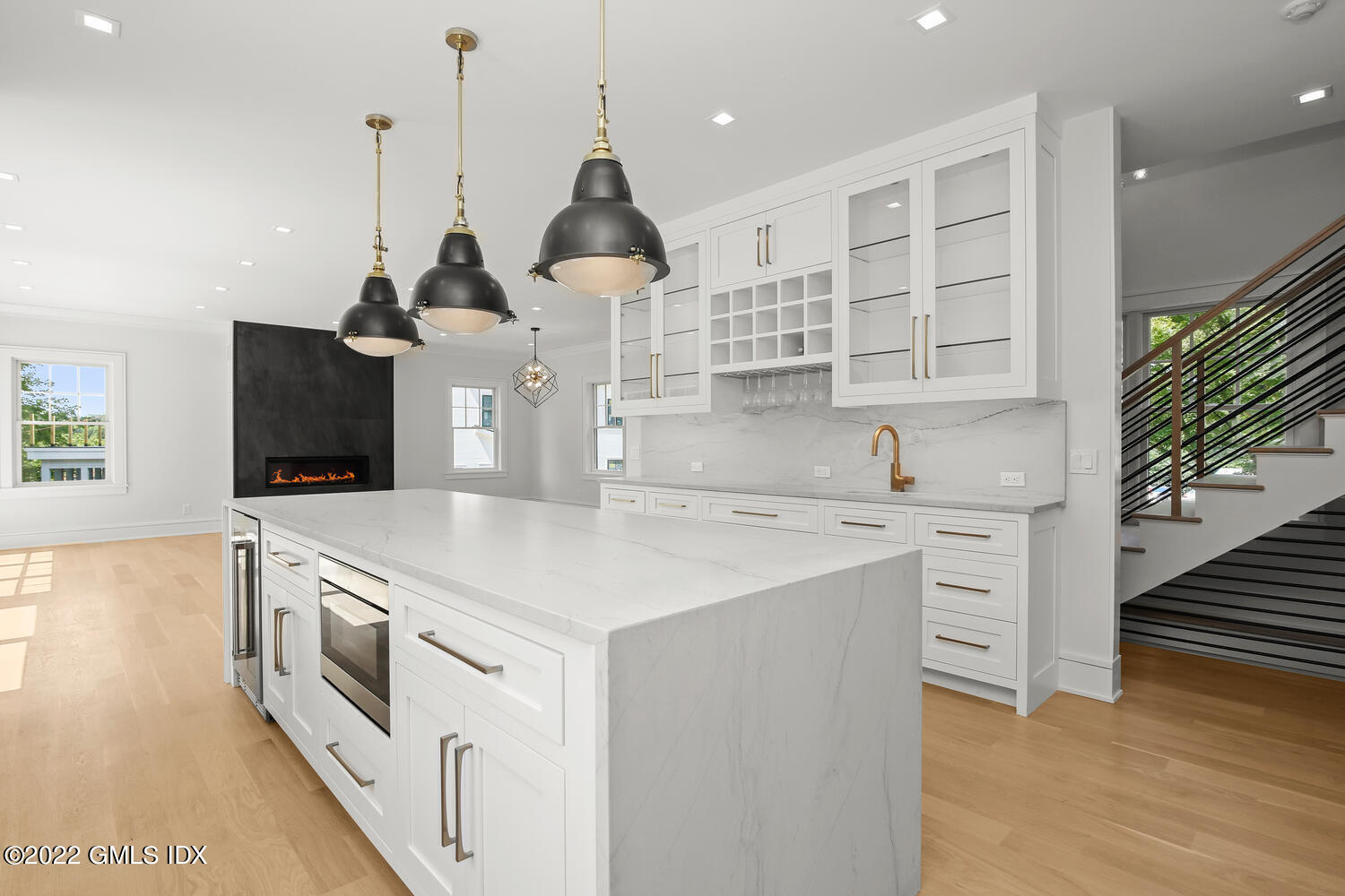106 Sheep Hill Road Riverside, CT 06878 - Photo 17 of 53 a kitchen with stainless steel appliances granite countertop a sink a stove and a wooden floors