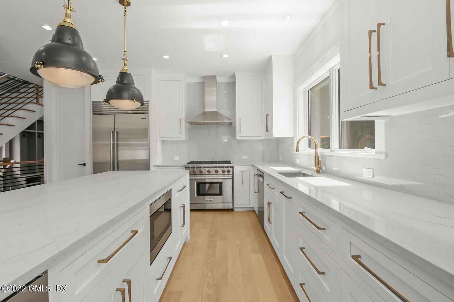 106 Sheep Hill Road Riverside, CT 06878 - Photo 18 of 53 a kitchen with a sink and a stove top oven